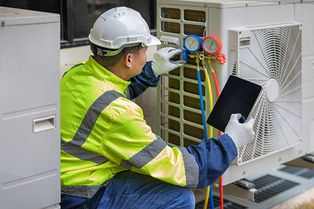 Professional Air Conditioning Repair technician working in Staley, NC